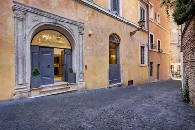 an entrance to a building with a blue door at Domus Domitia Luxury Living in Rome