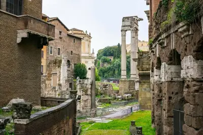 a view of the ruins of an old building at Over the Roman ruins in Rome