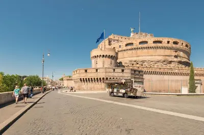 a large building with a street in front of it at Sweet Rhome Navona Loft Centro Storico in Rome