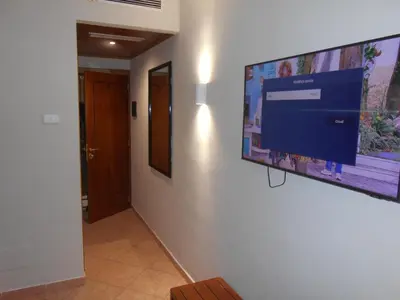 a hotel room with a bed with towels on it at Affittacamere REGIO in Rome