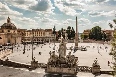 a large plaza with a statue in the middle at Domina Popolo in Rome