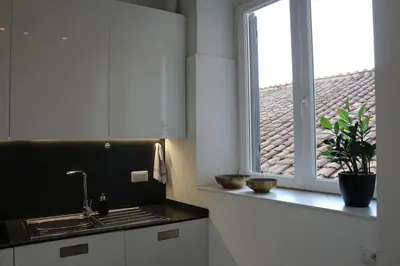 a hallway with a room with a bedroom and a bed at Trevi Fountain Luxury Flat in Rome