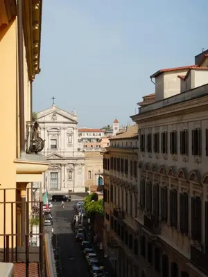 a view of a city street with buildings at Barberini Bright Apartment in Rome