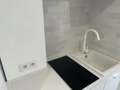 a bathroom with a sink and a faucet at Little Aventino BnB in Rome