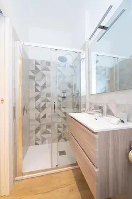 a bathroom with a shower and a sink at Domus Vatican Holiday in Rome