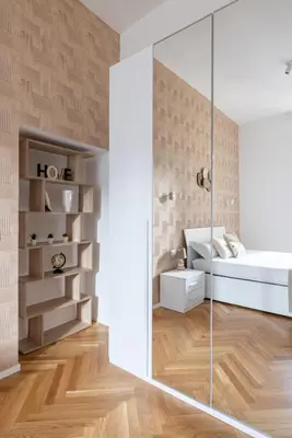 a bedroom with a glass door leading to a bed at Charming Vatican Apartment in Rome