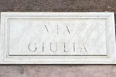 a sign that says va guillaume on the side of a building at Domus Paolina in Rome