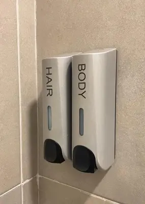 a white thermostat on a bathroom wall at The Room 15 in Rome