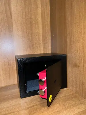 a small box with a red object inside of it at FRALE Home in Rome in Rome