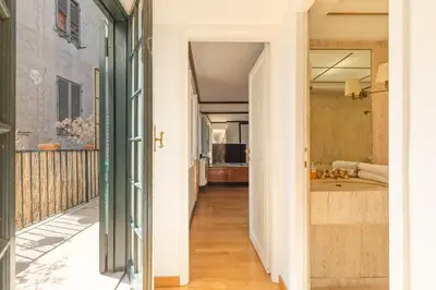 a hallway leading to the kitchen and living room of a house at Piede Charming Apartment in Rome