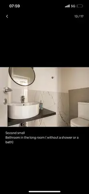 a bathroom with a sink and a mirror at Leonidas’s House in Rome