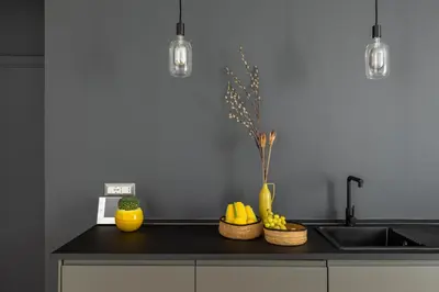 a kitchen with a counter with fruit and a sink at iFlat Sunny & Brand New Apartament near Vatican in Rome