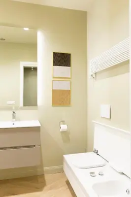 a bathroom with a sink and a mirror at MAISON CAIO 7 in Rome