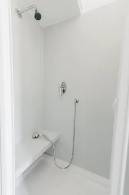 a bathroom with a shower with a shower head at Casa Boccea 112 in Rome
