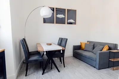 a living room with a couch and a table at Casa Boccea 112 in Rome