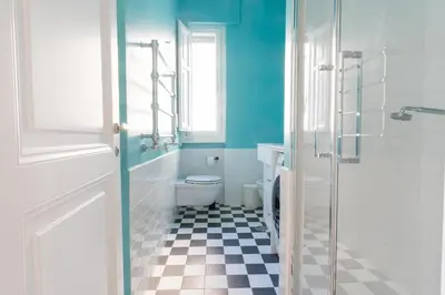 a bathroom with a toilet and a sink and a shower at Casa Mirabella in Rome
