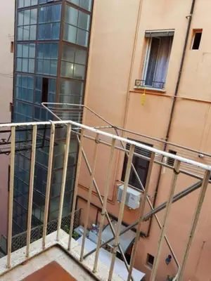 a bathroom with a sink and a mirror at La casa di Marisela in Via Emanuele Filiberto in Rome