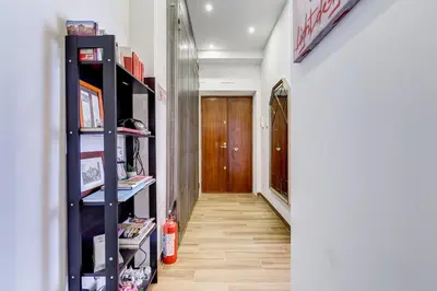a hallway with a room with a door and a shelf at Roma in relax lovely two room in the center of Rome, Fabrizia in Rome