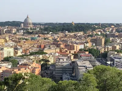 an aerial view of a city with a dome at Romolo House in Rome