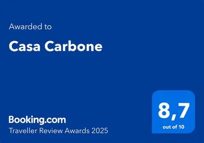 a blue sign with the text cancelled to csa carphone at Casa Carbone in Rome