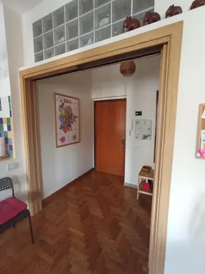 an open door into a room with a hallway at Casa Bambù in Rome