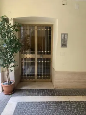an entrance to a building with a gate at Vaticano San Pietro metro ottaviano in Rome