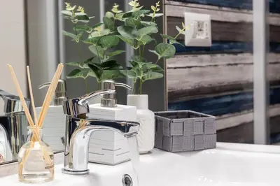 a bathroom counter with a sink and a faucet at BND Boutique Gemelli Vaticano in Rome