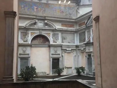 a large building with a painting on the ceiling at Residenza Bernini in Rome