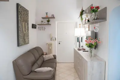 a living room with a couch and a table at A 200Metri Dal Vaticano, 2 Camere Da Letto in Rome