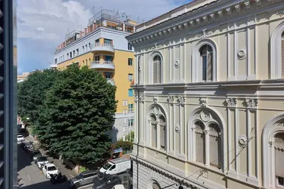 an overhead view of a building and a tree at Piccola Piazza Della Libertà in Rome