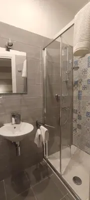 a bathroom with a shower and a sink at Portonaccio suite - Stazione Tiburtina - Università - Metro B in Rome
