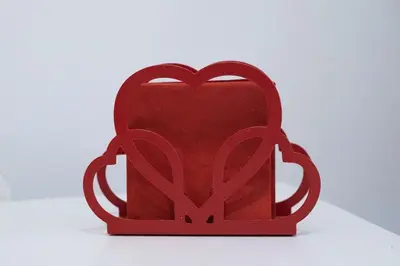 a red back pack sitting on a white surface at Easy Apartment in Rome