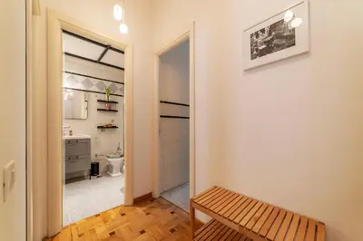 a bathroom with a sink and a toilet in a room at GuestHost - Trastevere Delightful Apartment in Rome