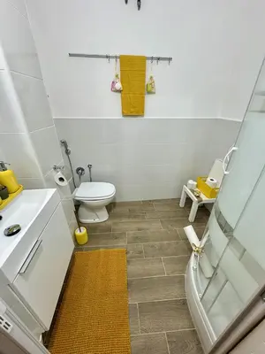 a bathroom with a toilet and a sink and a mirror at Paradise Suite Roma centro in Rome
