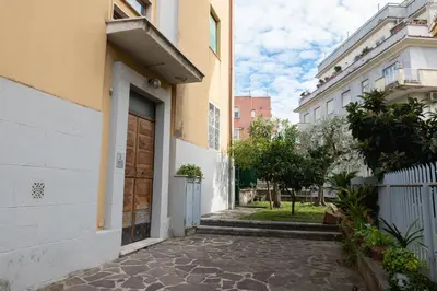 a building with a door on the side of a street at Guest house Sempione da Giulio in Rome
