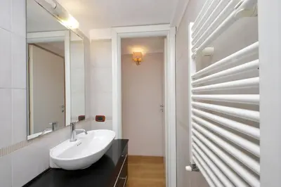 a bathroom with a sink and a mirror at Vaticano in Rome