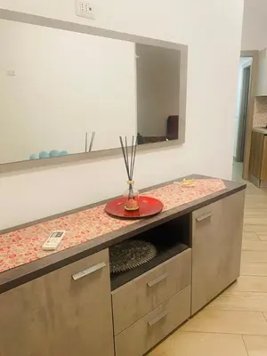a kitchen with a counter with a vase on it at Large Garden in Rome