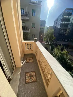 a balcony with a view of a building at A casa di Pele in Rome