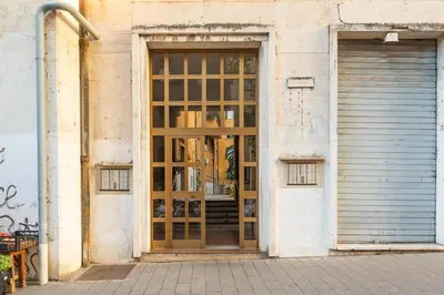 an open door to a building with a garage at Sweet Rhome to Colosseum in Rome
