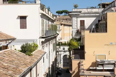 an alley in a city with buildings at Amazing Cozy Piazza Venezia in Rome