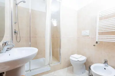 a bathroom with a sink and a shower at Rental in Rome 2012 Guest House - ZEN16 in Rome