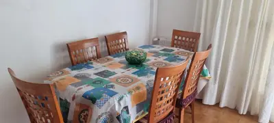 a dining room table with a potted plant on it at Dreamy Family Getaway Guest House Roma 2BR,2BA in Rome