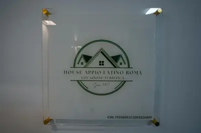 a sign for a house alpha livingrowing now for wine industry at House Appio Latino Roma in Rome