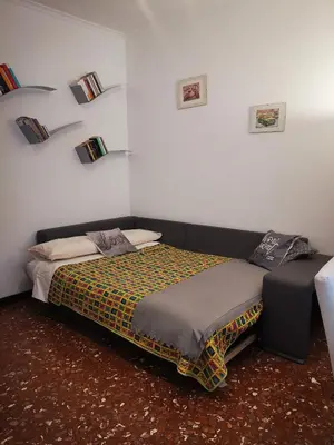 a bedroom with a bed in a room at Appartamento di Sara in Rome
