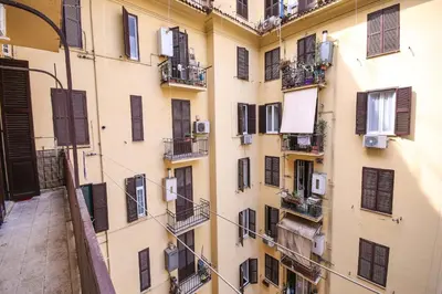an apartment building with windows and balconies at Rome Aparts - Deluxe Apartment with 3 bedrooms at St Peter square in Rome
