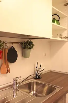 a kitchen with a sink and a counter top at Maison Yassi Piazza del Popolo in Rome