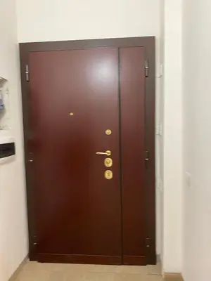 a large brown door with the number on it at CASA BALU' in Rome