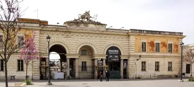 a large building with a statue on top of it at Casa MastroiannI con Terrazzo in Rome