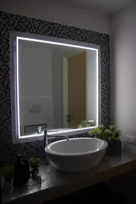 a bathroom with a large sink and a large mirror at Home Rent Mancini in Rome