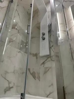 a shower with a glass door in a bathroom at 6 AL TOP in Rome